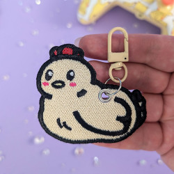 porte-clés poule beige à paillettes stardew valley