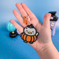 Porte-clé canard kawaii déguisé en citrouille pour Halloween